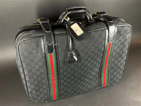 gucci combinaison|Gucci luggage sale.